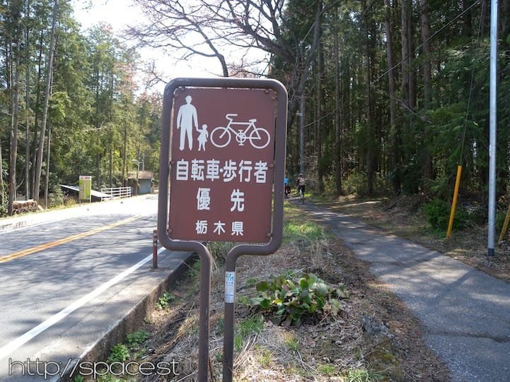 Cycling on the Nikko Kaido bike path through historic cedar avenue