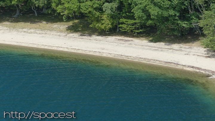 Crystal clear waters at Kumakubo Bear Cove, Lake Chuzenji south shore, Nikko