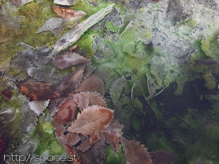 Iridescent mineral colours at Yumoto Onsen source, Nikko Japan