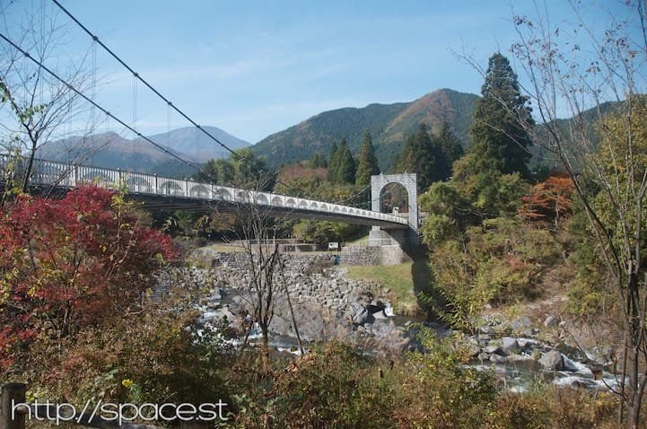 Dainichi Bridge and autumn leaves and Nantai in the far left background
