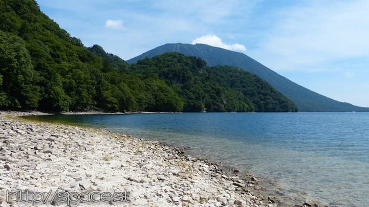 Kumakubo cove with Nantai Mountain reflected in Lake Chuzenji, Nikko Japan