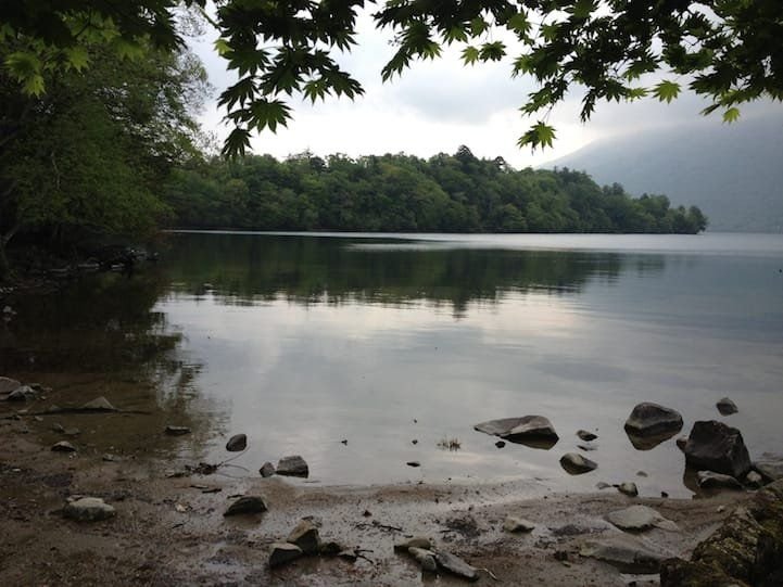 Tranquil Lake Chuzenji from Mujinakubo bay, end of Hangetsu descent, Nikko