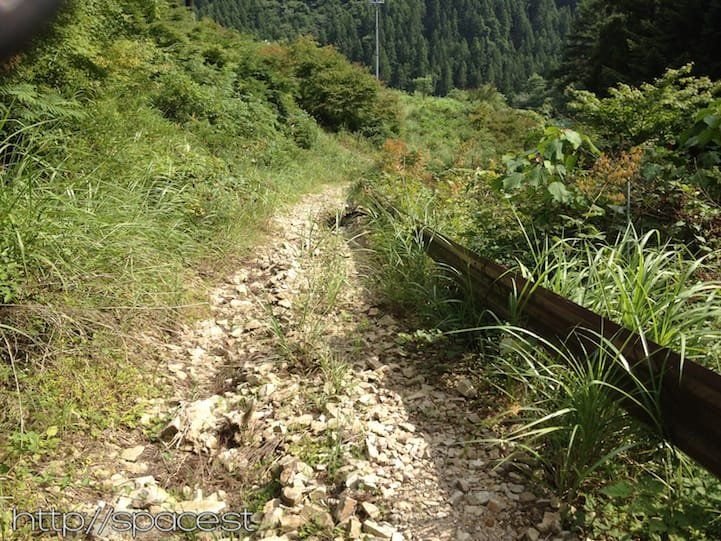 Sasamekura mountain trail beginning, simple stone path through forest, Nikko