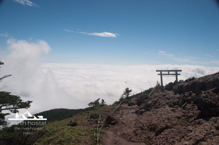 Hikers ascending the trail on Mount Nantai volcano, Nikko Japan