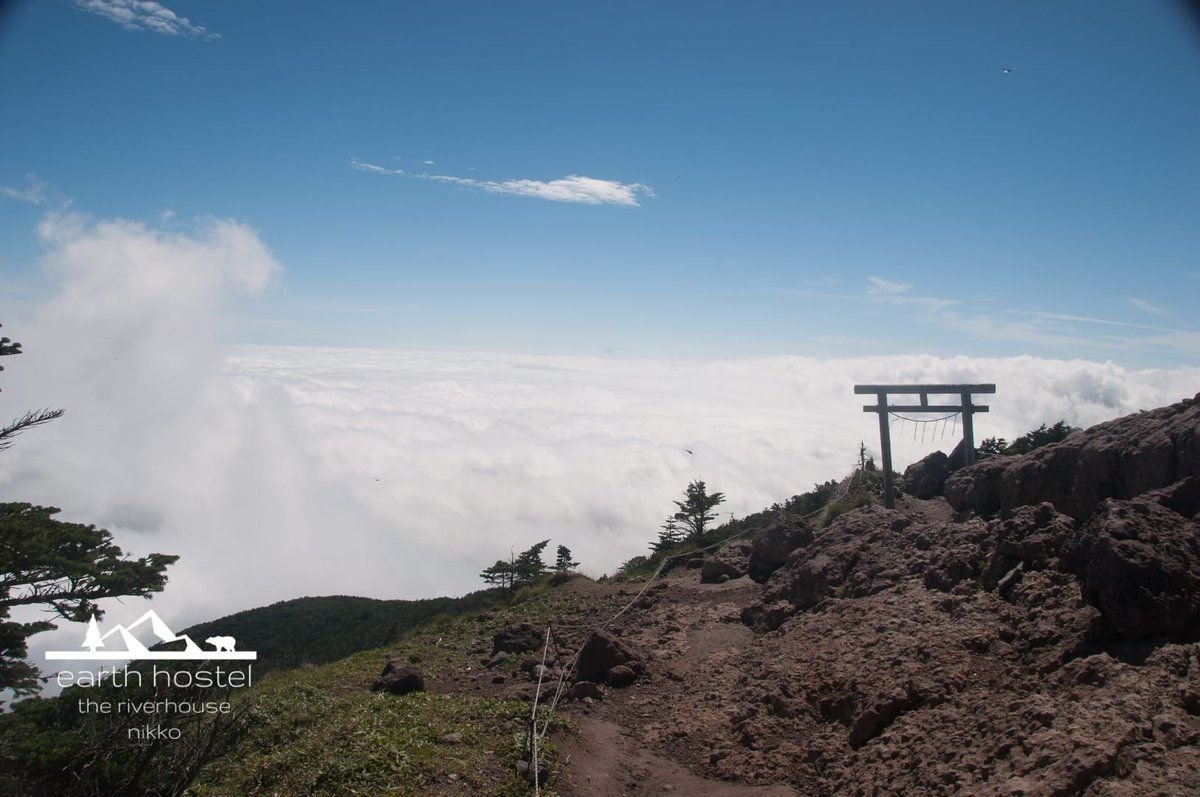 Hikers ascending the trail on Mount Nantai volcano, Nikko Japan