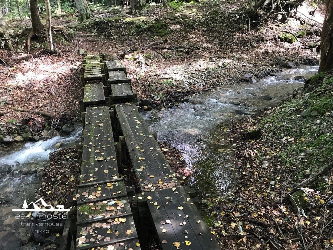 Creek crossing on the Lake Chuzenji south shore trail, wooden planks, Nikko National Park