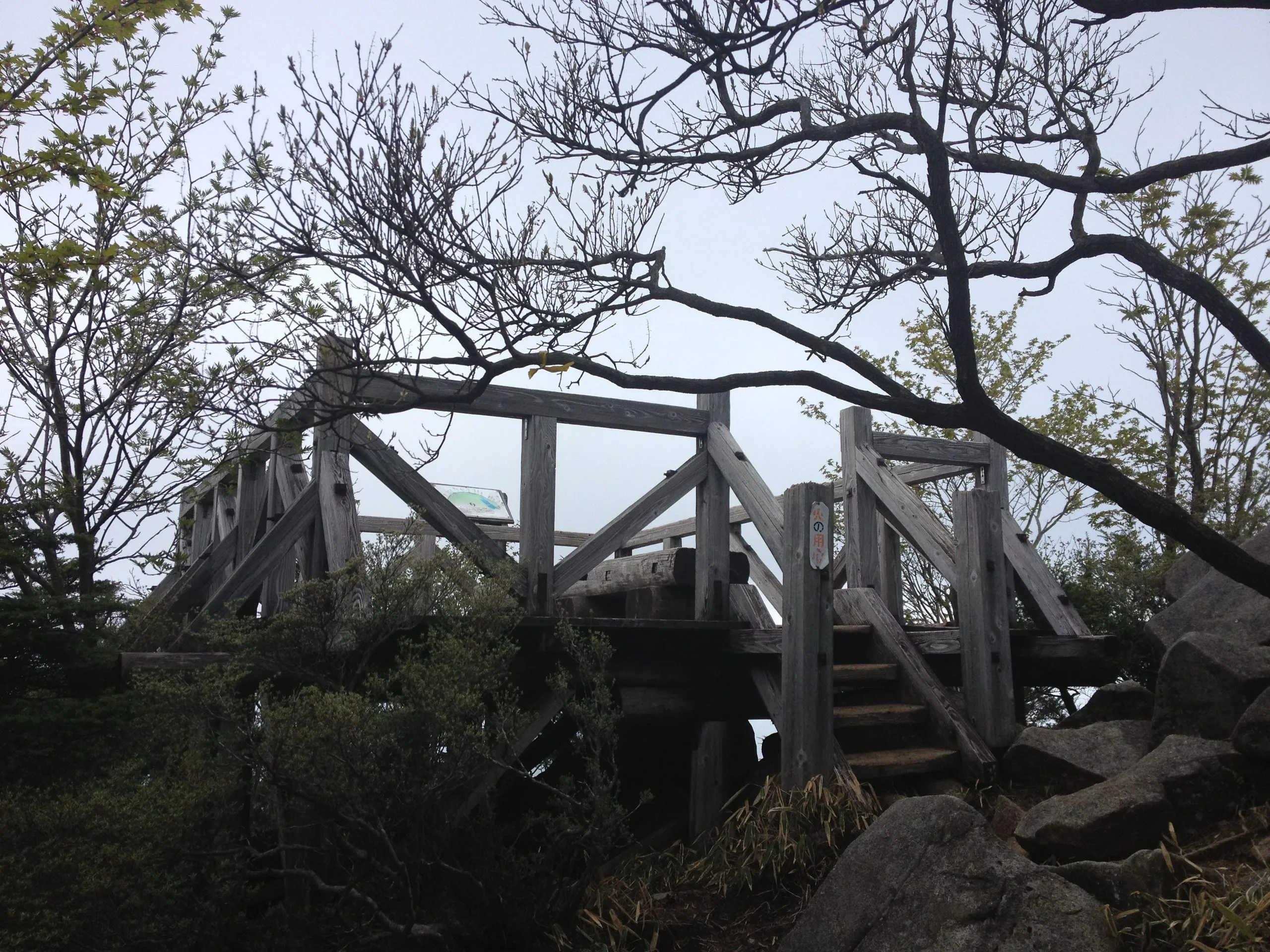 The peak of Hangetsu is actually completely surrounded by trees with no view of the area, you have to continue about 10 minutes to the lookout deck further along the path
