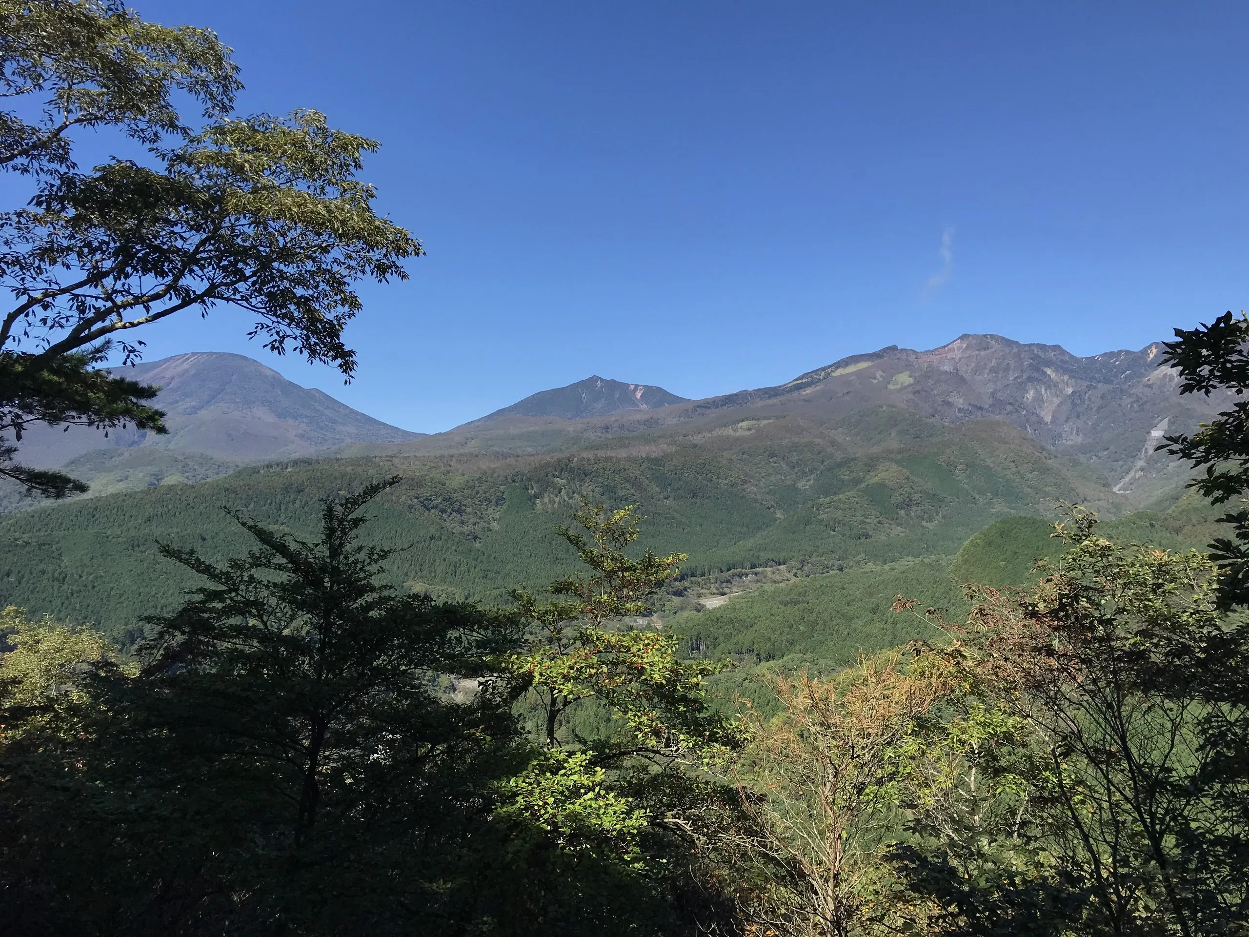 Mount Nantai and Mount Nyoho seen from the Mount Toyama hiking trail, Nikko Japan