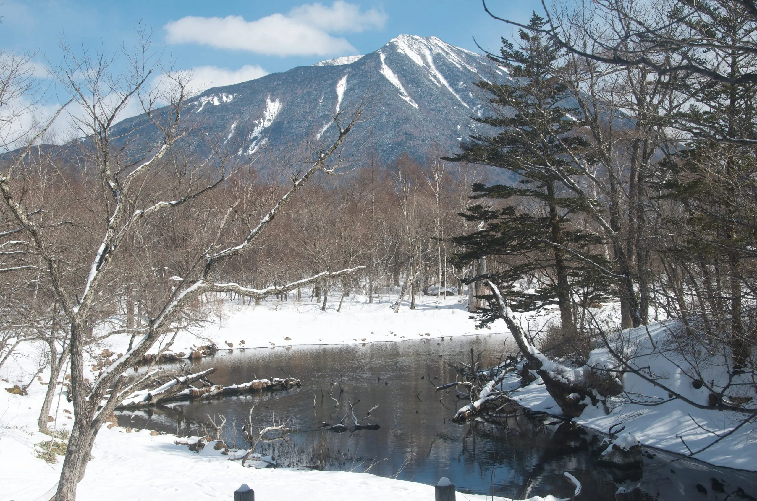 Nantai Mountain with its caldera rim visible above a bend in the Yukawa, Senjogahara, Nikko Japan