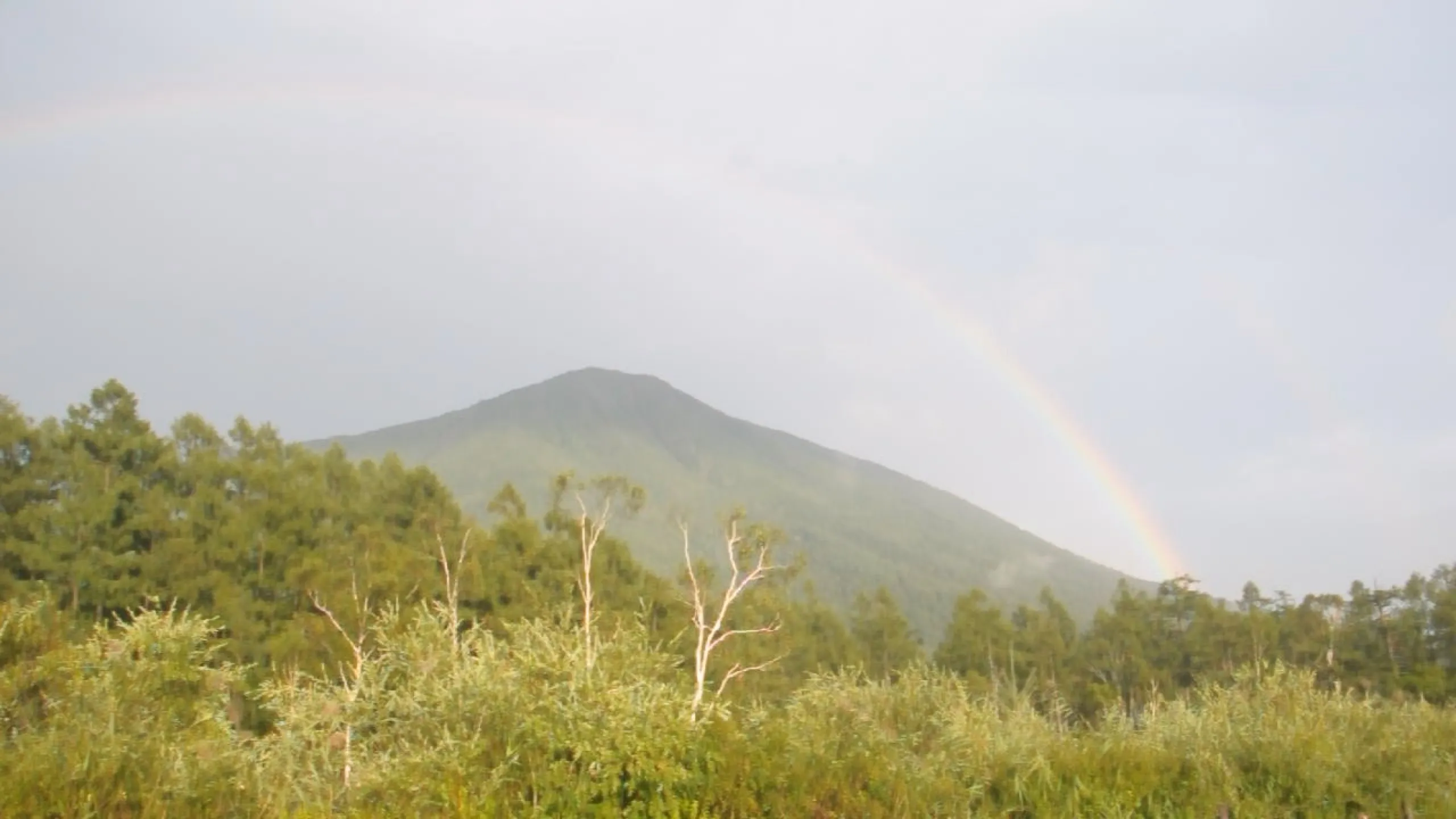 A double rainbow over Nantai Mountain seen from the Senjogahara plateau, Nikko Japan