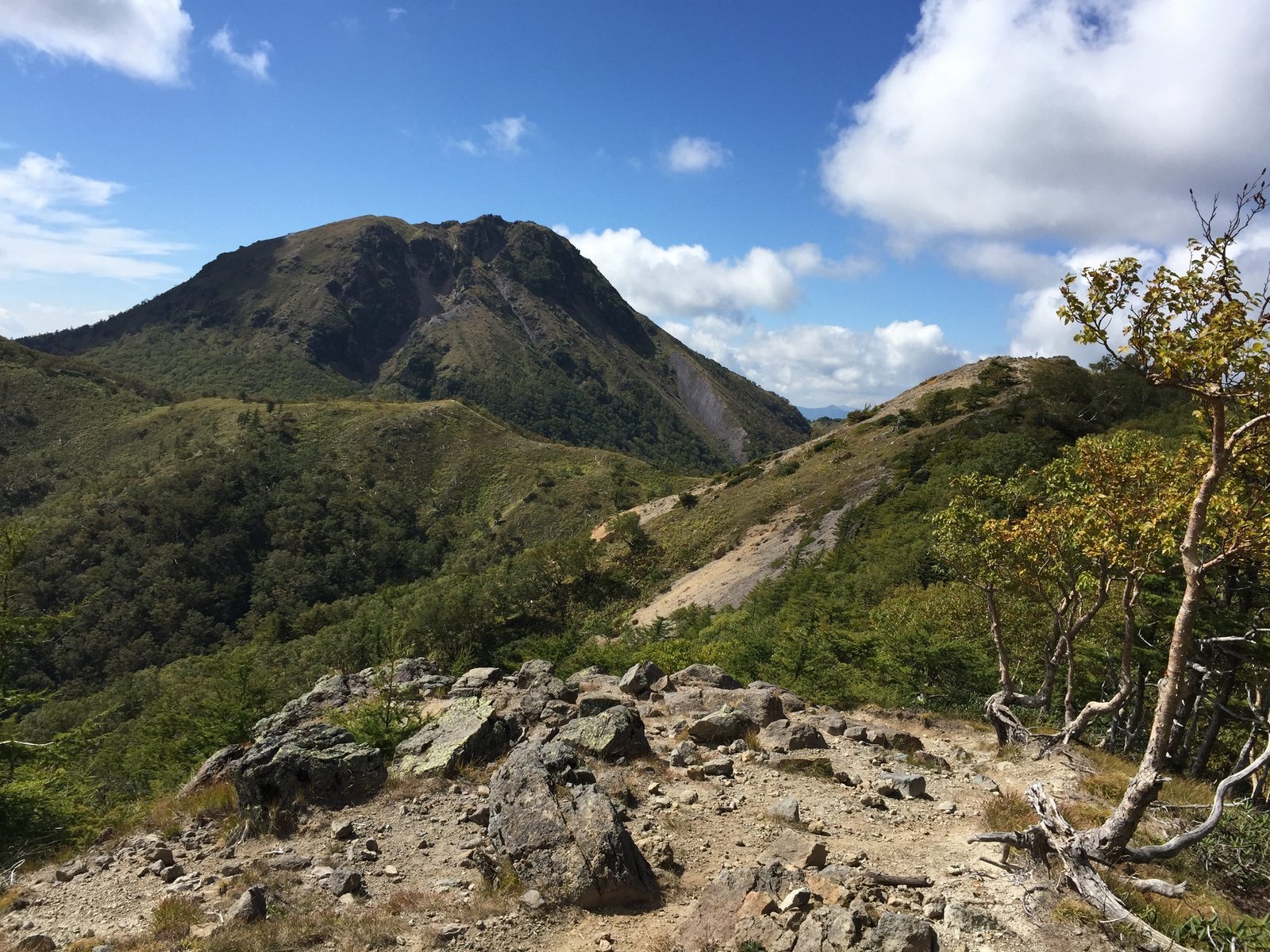 The volcanic dome of Mount Shirane seen across the ridge on the approach, Nikko Japan