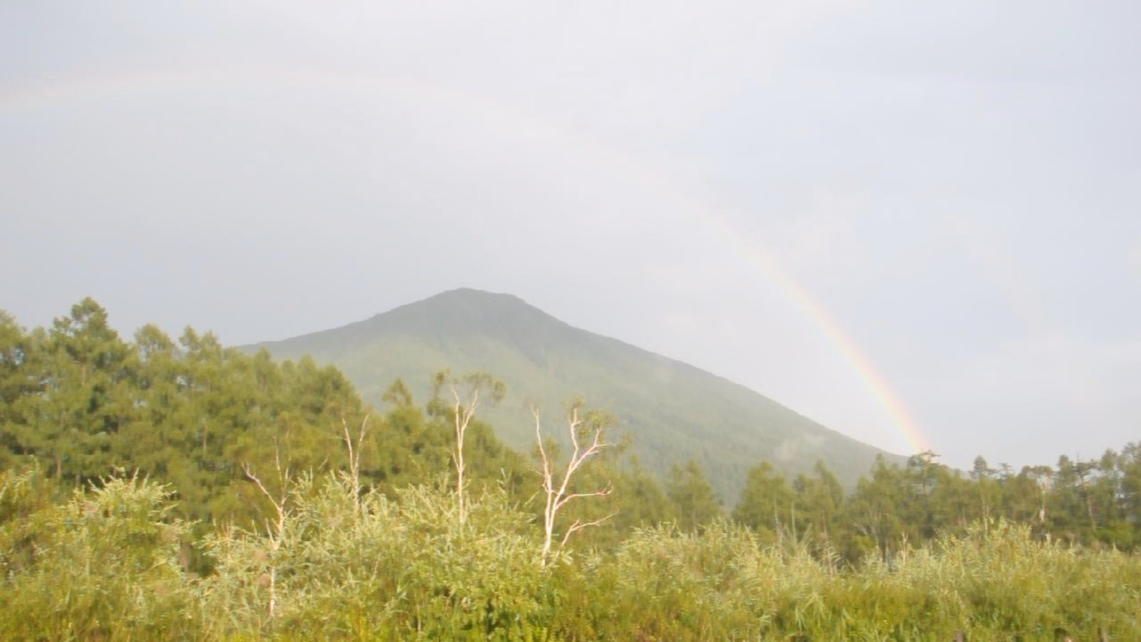 A double rainbow over Nantai Mountain seen from the Senjogahara plateau, Nikko Japan