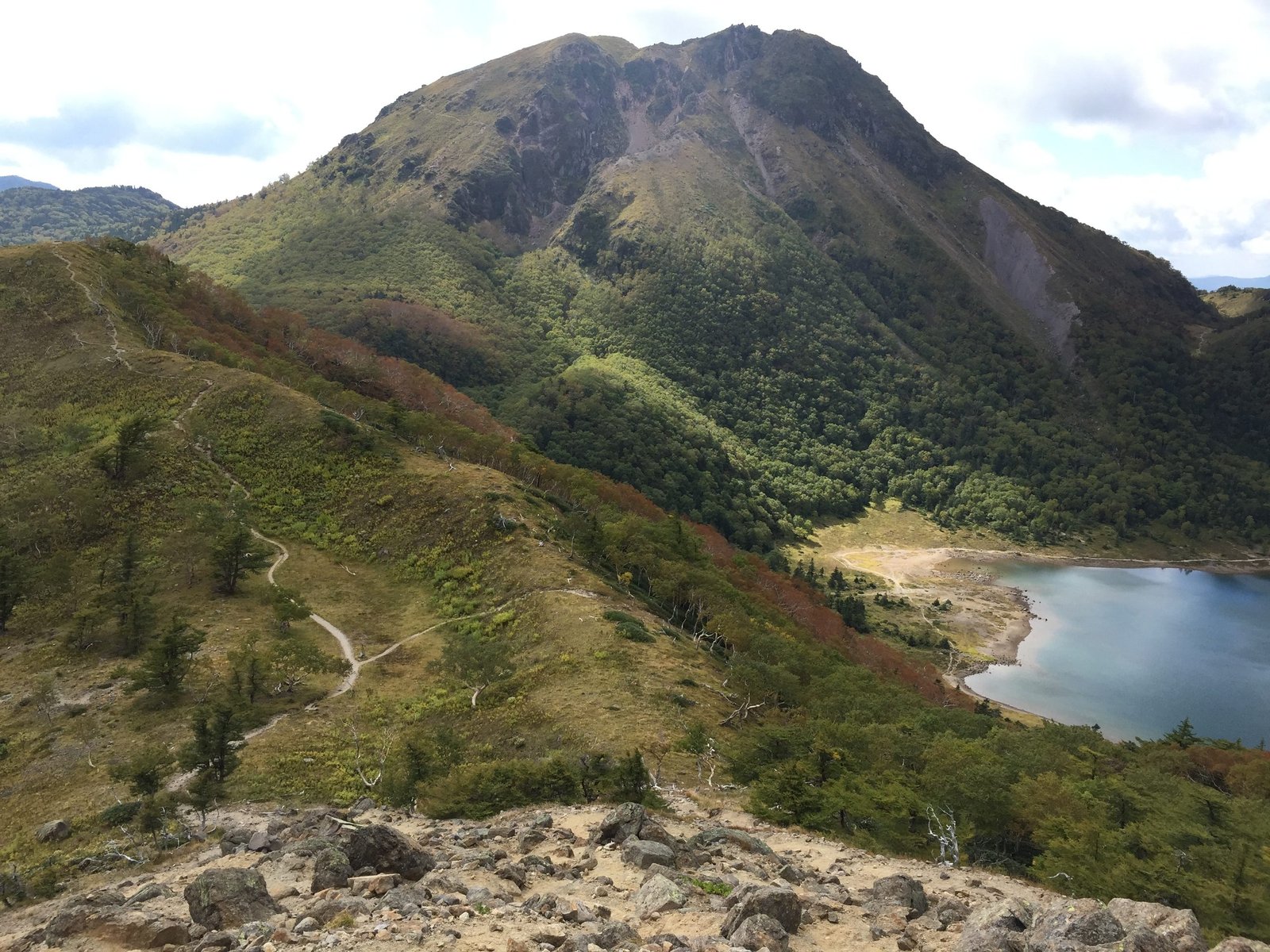 Mount Shirane rising above Goshikinuma pond in the basin below, Nikko Japan