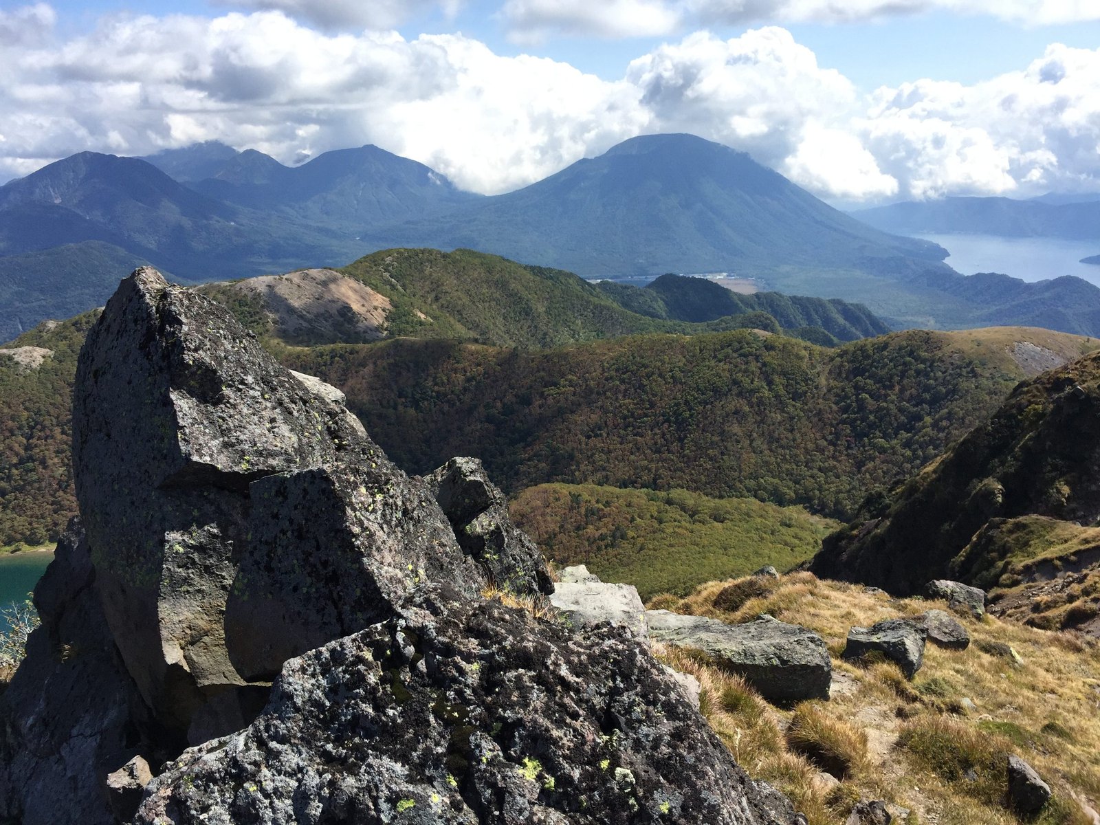 Mount Nantai and Lake Chuzenji seen from the rocky summit of Mount Shirane, Nikko Japan